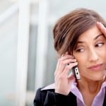 business woman on phone with problem